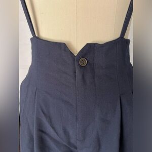 Forever 21. Women’s size 25. Navy blue trousers with straps .